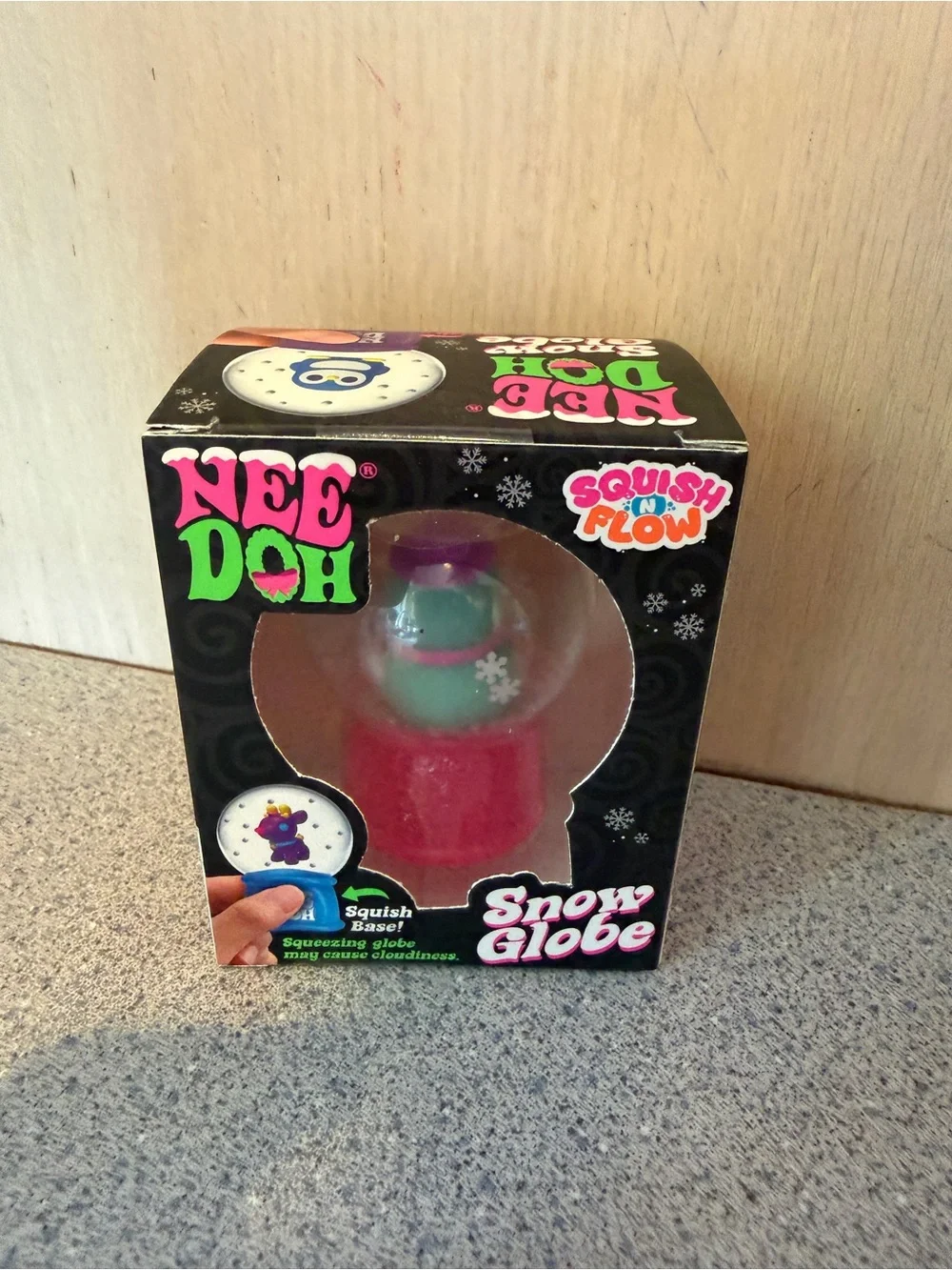 NeeDoh Pink Snow Globe Squishy Toy with Teal Snowman